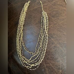 Multi strand gold and bronze beaded layered chain necklace